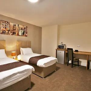 New County & Serviced By Roomsbooked Hotel